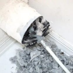 What causes soot buildup in the heat exchanger and vent